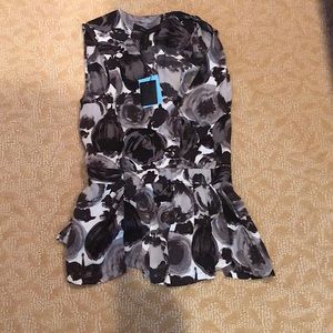 Woman’s black and grey blouse